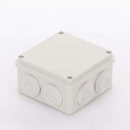 Caja Derivación-Conexión de Plástico (100 X 100 X 54 mm) con 7 Glándulas de Goma. Para Instalaciones Comerciales, Residenciales e Industriales. Incluye Tornillería para su Tapa.